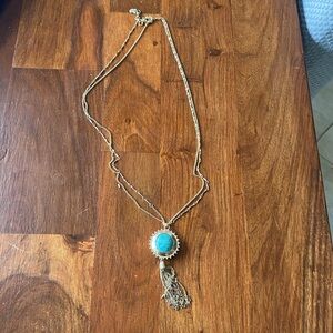 Double gold chain with reversible pendant